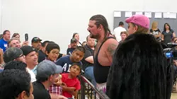 TRASH TALKERS : Rik Luxury and his manager Markus Mac get the crowd riled by yelling at kids. How could you not want to see his face get broken? - PHOTOS BY NICK POWELL