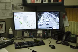 TOTAL CONTROL : From his cubicle in the SLO Public Works Department, Senior Traffic Engineer Jake Hudson can at any time access video feeds from traffic cameras throughout the city. - PHOTOS BY STEVE E. MILLER