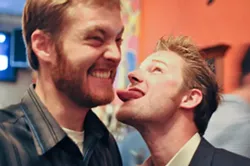 NO FACE LICKING, PLEASE : Next generation reporters Matt Fountain and I perform the official New Times initiation ritual. - PHOTO BY ANNA WELTNER