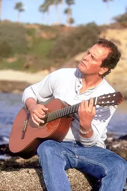 SEGOVIA-TRAINED! : Amazing Spanish-style guitarist Eric Henderson plays two SLOfolks concerts: Jan. 14 at Coalesce Bookstore and Jan. 15 at Castoro Cellars. - PHOTO COURTESY OF ERIC HENDERSON