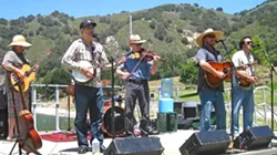 SWINGIN’ OUTSIDE : Cuesta Ridge brought their folksy tunes to a downright beautiful venue by the lakeshore. Zongo Allstars and Morning Rise also took the stage for the Outdoor Discovery Festival. - PHOTO BY NICK POWELL