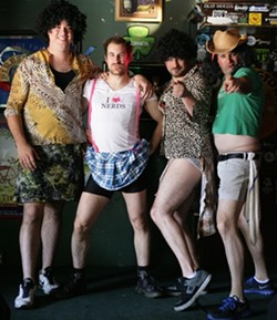 DUDES LOOK LIKE LADIES &hellip; NOT REALLY :  (Left to right) Zoe Baysinger, Cody Polakowski, Joss Mississippi, and Cody Hartwell strutted their stuff on April 7 at Frog and Peach, with tips going to autism research. - PHOTO BY GLEN STARKEY