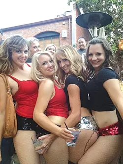 GO-GO GIRLS: Dancers from the Plaza main stage got their drink on creekside at the Novo patio on July 14. - PHOTO BY MAEVA CONSIDINE