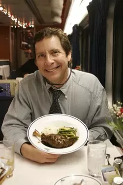 SOUL TRAIN: : Train aficionado and Amtrak volunteer David Weisman brought New Times along for the ride on the Christmas Day party train to Gaucho Town. - PHOTO BY MATT FOUNTAIN