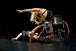 REACH : Axis dancers Sonsherée Giles and Alice Sheppard perform in Alex Ketley’s “Vessel.” - PHOTO BY KEVIN COLTON