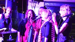 OOH-OOH, AH-AH: Risky Whippet regulars Connor Parsons (far left) and Wendelin Van Draanen (far right) encouraged the Whippettes of Dec. 13 (center left to right: Teri Bayus, Ryan Miller, and Wendy Thies Sell) to sound more like singers and less like monkeys as they ah-ah-ahed their way through a Who holiday number. - PHOTO BY VAL PILLOW