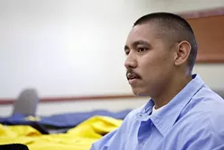 BETWEEN A ROCK AND A HARD PLACE : Manuel Arias is a model prisoner who’s completed his GED and is taking college correspondence courses, but due to mandatory sentencing laws, he’ll cost taxpayers another $200,000 before he’s released. - PHOTO BY STEVE E. MILLER