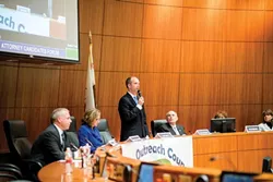 THIS GOT AWKWARD: As colleagues and now political opponents, district attorney candidates Tim Covello (pictured bottom) and Dan Dow exchanged a few heated words at a recent debate hosted by the SLO Latino Outreach Council. - PHOTO BY HENRY BRUINGTON