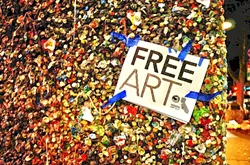 ART IN THE ALLEYWAY: Though often seen as either eccentric or disgusting, Cal Poly student Grafton Houston argues that Bubblegum Alley affords visitors a chance to both view and participate in the making of art. - PHOTO BY JESSICA PEÑA