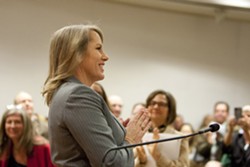 A MUCH-ANTICIPATED APPOINTMENT:  Caren Ray thanked a crowded room of supporters for the standing ovation after she was sworn to her new seat as SLO County 4th District supervisor on Oct. 8. - PHOTO BY STEVE E. MILLER