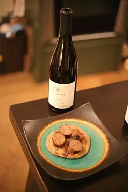 COURSE THREE : Apple sausage over homemade flatbread with caramelized onions and stone ground mustard goes great with the silver medaled 2008 Pinot Noir. - PHOTO BY GLEN STARKEY