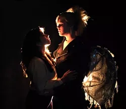 ANGEL’S KISS : The play’s title character, played by Anna Acuña, shares a sexual attraction with her guardian angel, played by Ellen Jones. - PHOTO COURTESY OF CAL POLY THEATRE DEPARTMENT