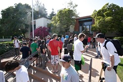 FIGHT FOR THE RIGHT TO OLLIE:  Skaters swarmed SLO City Hall on May 20 and were rewarded for their civic activism with a City Council pledge to pay to design a bigger and better skate park at Santa Rosa Park. - PHOTO BY STEVE E. MILLER