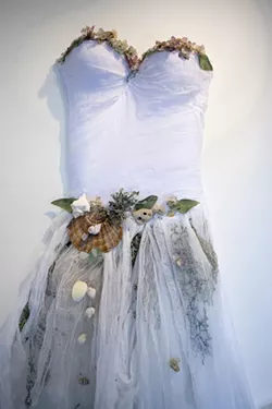 TREASURES OF LAND AND SEA : Gaia’s Gown, by Jennifer Blue, incorporates treasures of the ocean into wearable art. - PHOTO BY STEVE E. MILLER