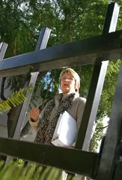 GATED COMMUNITY : Good fences make good neighbors, and also keep transients from sitting here, in front of the Broad Street bathrooms across from Big Sky CafÈ. Betsy Kiser (pictured), facilitator for the Transient Task Force, says this is one of the group’s most remarkable success stories. - PHOTOS BY CHRISTOPHER GARDNER