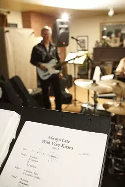 THE MAGIC BOOK : Every member of The Bangin' 58's got a copy of the band's songbook, which has the lyrics and music notations for all 150 of the band's songs. - PHOTO BY STEVE E. MILLER