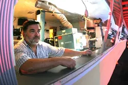 MOVIE MAN: Larry Rodkey, owner of the Sunset Drive-In, has movies in his blood. His father Raymond ran the drive-in when it was opened in 1950 by the Pasquini family. - CHRISTOPHER GARNER