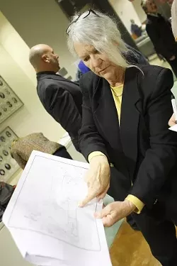 KEEP 'EM OUT : Nell Langford, an off-highway-vehicle opponent and member of Safe Beach Now, believes the Oceano Dunes would be safer if cleared of all motorized vehicles. She's pictured here preparing to speak about a different dunes issue--proposed bathrooms--before the SLO County Board of Supervisors meeting on Jan. 15. - PHOTO BY STEVE E. MILLER