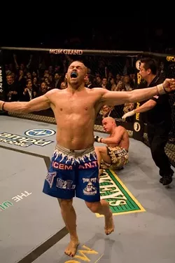 THE ICEMAN ROARETH : Ultimate Fighter Chuck Liddell, seen here in a previous fight, faces Wanderlei "The Axe Murder" Silva at UFC 79 on Dec. 29 at the Mandalay Bay Events Center in Las Vegas. - PHOTO COURTESY OF UFC/JOSH HEDGES