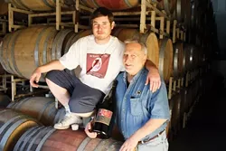 A TIME FOR FAMILY : Winemaker Ardison Phillips (right) planned on enjoying a traditional Thanksgiving with family and friends. Also pictured is his son, Bailey. - PHOTO BY STEVE E. MILLER
