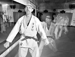 CAN DO : Koei-Kan Karate-Do owner and instructor Larry Rhodes is celebrating his martial arts dojo's 15th anniversary with plenty of kick. - PHOTO BY STEVE E. MILLER