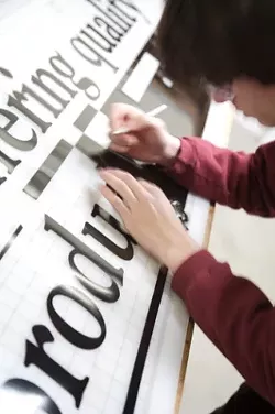 ALL BUSINESSES BIG AND SMALL : Designing and printing advertising materials for other businesses can be a lot of work, but the results are well worth the effort for GenoaGraphix owner Paul Ferroggiaro. - PHOTO BY JESSE ACOSTA