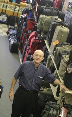 CARRYOVER BUSINESS :  Bob Douglass, owner of San Luis Luggage, purchased a Rasco&acirc;&euro;&trade;s Five and Dime store in 1971, which has since evolved into a specialty luggage store. - PHOTO BY CHRISTOPHER GARDNER