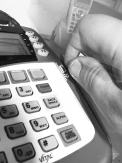 HOUSE OF CARDS : Many college students aren't educated enough about credit cards before filling out their first application, studies show. - PHOTO BY STEVE E. MILLER