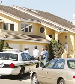 CRIME SCENE : Three people including one child were found dead when police responded to an emergency call at a San Luis Obispo home. - PHOTO BY STEVE E. MILLER