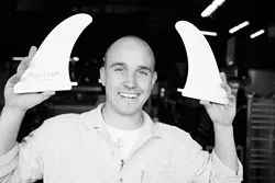THE SHAPE OF FINS TO COME : Henry Swales took a green business model to the waves with Fluid Earth and his eco-friendly surfboard fins. - PHOTO BY STEVE E. MILLER