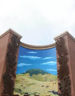 VERISIMILITUDE: When the Marsh Street Parking Garage blotted out the view of Cerro San Luis from the corner of Morro and Pacific streets, artists Carol Paulson and Stephen Plowman decided to create “Magic Sister,� a mural that recreates the view in paint. - GLEN STARKEY