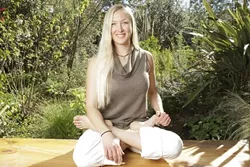SITTING LOTUS : Amy Swanson, owner of The Yoga Centre, entered into a lease agreement with Michael Brevetz, to share space at Tridosha. When Tridosha collapsed, she was left without a studio--or a refund for her rent and deposit. - PHOTO BY STEVE E. MILLER