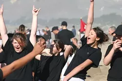 VICTORY? : Some of the cadets saw the ocean for the first time during a trip to the beach, where they participated in a sandcastle-building competition. - PHOTO COURTESY OF THE GRIZZLY YOUTH ACADEMY