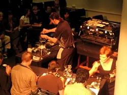 COFFEE IS CULINARY : Chris Bord of Linnaea's Cafe competed in the Western Regional Barista Competition in late March, with a handful of judges watching his every pour.