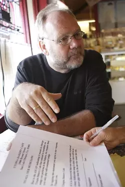 MUSIC MAN : Kees Docter, owner of Utopia Bakery in San Luis Obispo, said that lawyers' letters involving copyrighted music are his biggest headache as a business owner. - PHOTO BY STEVE E. MILLER