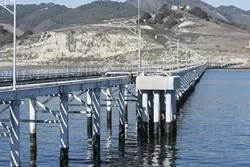 SIGHTING LAND : The Cal Poly Pier opened to the public for one day in mid-November, but officials plan to repeat the event once a quarter, so locals can explore the research and student work that happens on the steel and concrete structure. - PHOTO BY STEVE E. MILLER