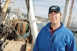 CONSERVING THE RESOURCES : Michael Bell of The Nature Conservancy is working with local fishermen on a new model for managing and harvesting local fish in a sustainable way for the environment, the community, and the fishing industry. - PHOTO BY STEVE E. MILLER