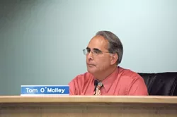 UNDER FIRE : Atascadero Mayor Tom O’Malley listens to complaints and concerns of an irate constituency at the City Council meeting May 23. - PHOTO BY NICK COURY