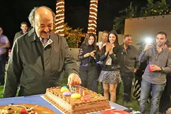 CUT THE CAKE: Katcho Achadjian missed the mark in the primaries, but he at least got to celebrate his June 2 birthday at his election night party. - PHOTO BY DYLAN HONEA-BAUMANN