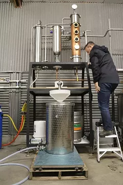 ALL IN A DAY’S WORK: With a combined 40 years of winemaking experience, Stephen Kroener (pictured) and distillery co-owner Joe Barton know a thing or two about manipulating wine grapes into high-proof spirits. - PHOTO BY DYLAN HONEA-BAUMANN