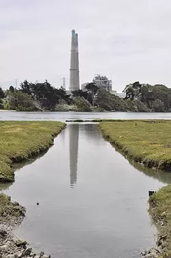 ICONS: It wouldn’t be Moss Landing without that pair of smokestacks soaring above the Elkhorn Slough. Those mark the beginning of an up-close tour of area wildlife. - PHOTO BY CAMILLIA LANHAM