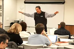 AT THE HELM: Dean Mitch Winick, who oversees the Monterey College of Law and the SLO College of Law, talks to students at the SLO campus. - PHOTO BY DYLAN HONEA-BAUMANN