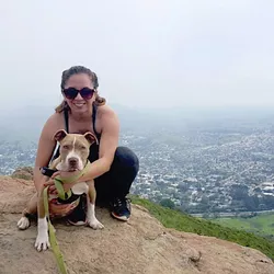 STARTED FROM THE BOTTOM, NOW WE’RE HERE: After being put in puppy leg casts to heal his front legs that were bent due to malnourishment, Hercules the puppy is now hiking Madonna Mountain like a champ. - PHOTO COURTESY OF RYAH COOLEY