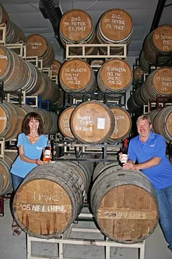 BARRELS FOR DAYS: Lola and Steve Glossner may have started off their business with Paso Port, but the pair couldn’t resist the allure of offering their own wine and brandy. - PHOTO BY HAYLEY THOMAS