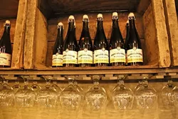 SLO HIDEOUT: Templeton-based BarrelHouse Brewing Company recently opened its first SLO taproom location on Chorro Street. The rustic, two-story hangout boasts a speakeasy feel below and a working two-chair barber shop above. - PHOTO BY DYLAN HONEA-BAUMANN