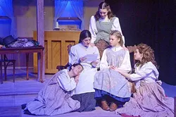 JUST US GIRLS: Marmee (Allison Warren) reads a letter from Father, who is away at war, to the March sisters, Beth (Abigail Dorman), Jo (Elizabeth Tharp), Amy (Linnae Marks), and Meg (Samantha Mucciacito). - PHOTO COURTESEY JAMIE FOSTER PHOTOGRAPHY