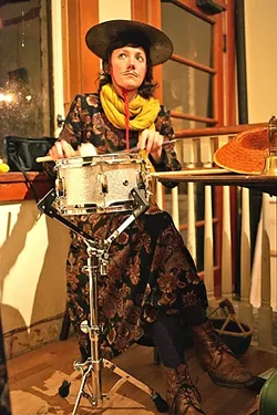 GONG : Percussionist Rakka Down keeps the rhythm and punctuates the proceedings by tapping her cymbal hat. - PHOTO BY GLEN STARKEY