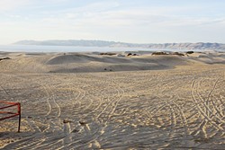 PARTICULATE PARTICULARS:  Friends of Oceano Dunes, which spent 84 percent of its total revenue in 2014 on legal costs, filed yet another lawsuit in its fight over the SLO County Air Pollution Control District&rsquo;s dust emissions rule on March 4. - FILE PHOTO BY STEVE E. MILLER