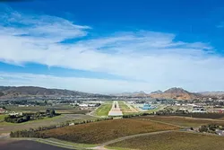 A MILITARY CONNECTION: The SLO County Regional Airport was once used by the Army, Navy, and National Guard during World War II. That use may be connected to the recent discovery of contaminated groundwater in nearby private wells. - FILE PHOTO BY KAORI FUNAHASHI