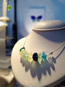 STUNNING : Sea glass, treasured by local collectors and artists, is the star of an upcoming Cayucos festival. Recent rumors suggest that the demand may have prompted a few aficionados to start dumping broken glass into the ocean with the goal of making more. - FILE PHOTO